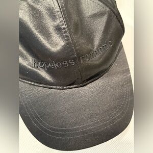 HOPELESS ROMANTIC black satin cap NWT FROM August Hat Company. Woman’s fit.